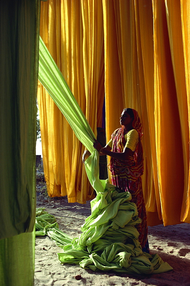 Woman working with textiles, Ahmedabad, Gujarat, India, Asia