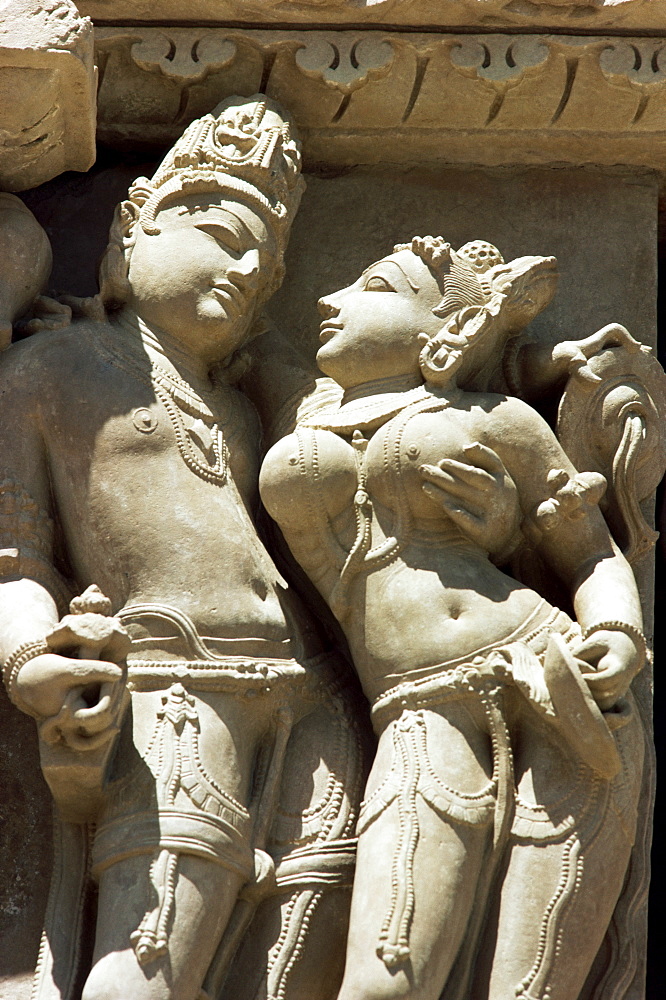 Detail of carving of a couple on the Parsvanatha Temple, Khajuraho, UNESCO World Heritage Site, Madhya Pradesh state, India, Asia