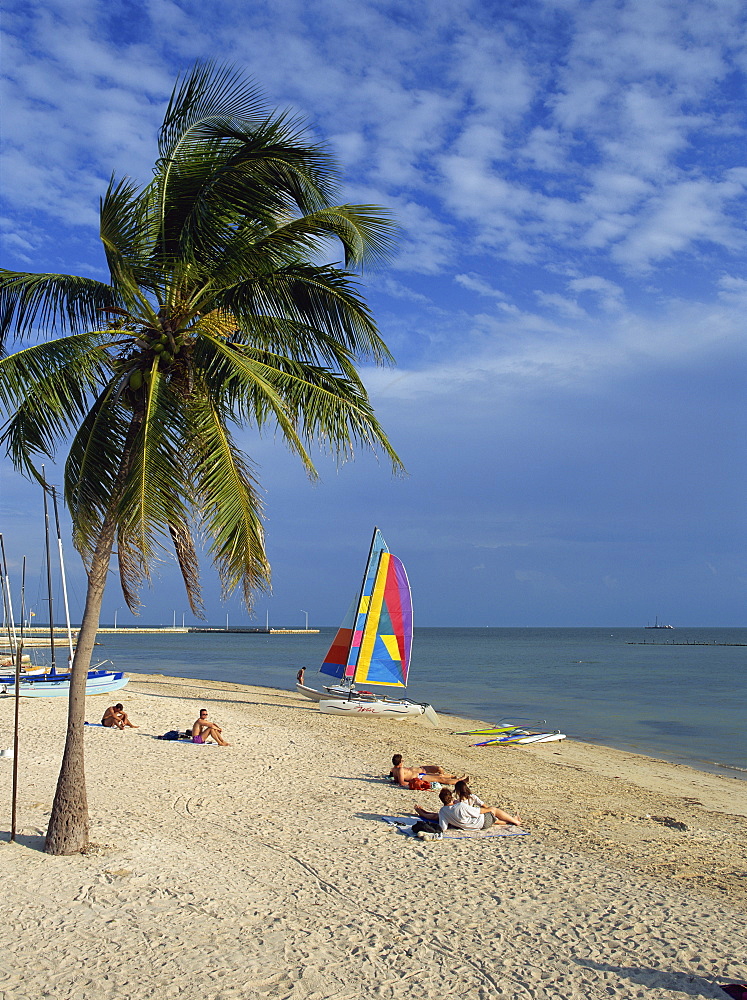 People on the beach in the late afternoon, Key West, Florida, United States of America, North America