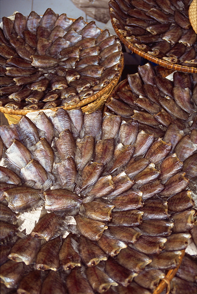 Fish laid out in patterns in baskets in a street market in Bangkok, Thailand, Southeast Asia, Asia