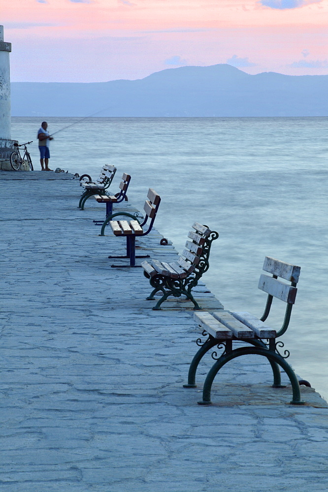 Fishing on jetty at dawn, Halkidiki, Greece, Europe