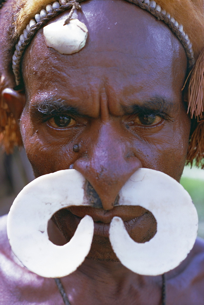 Portrait of an Asmat man with nose ornament, Papua New Guinea, Pacific