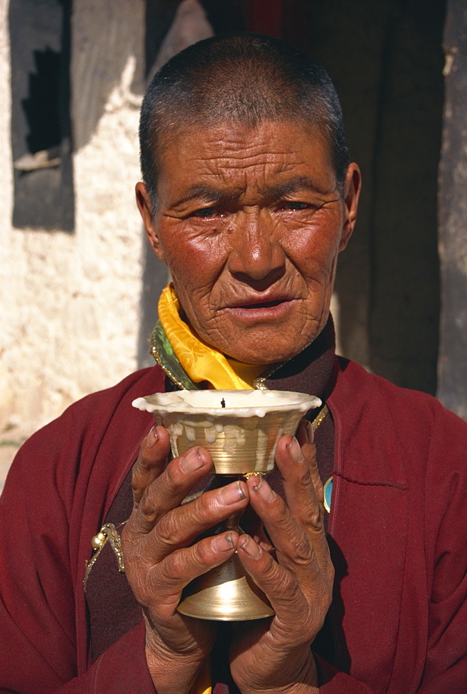 Woman on pilgrimage, Ganden Monastery, Tibet, China, Asia