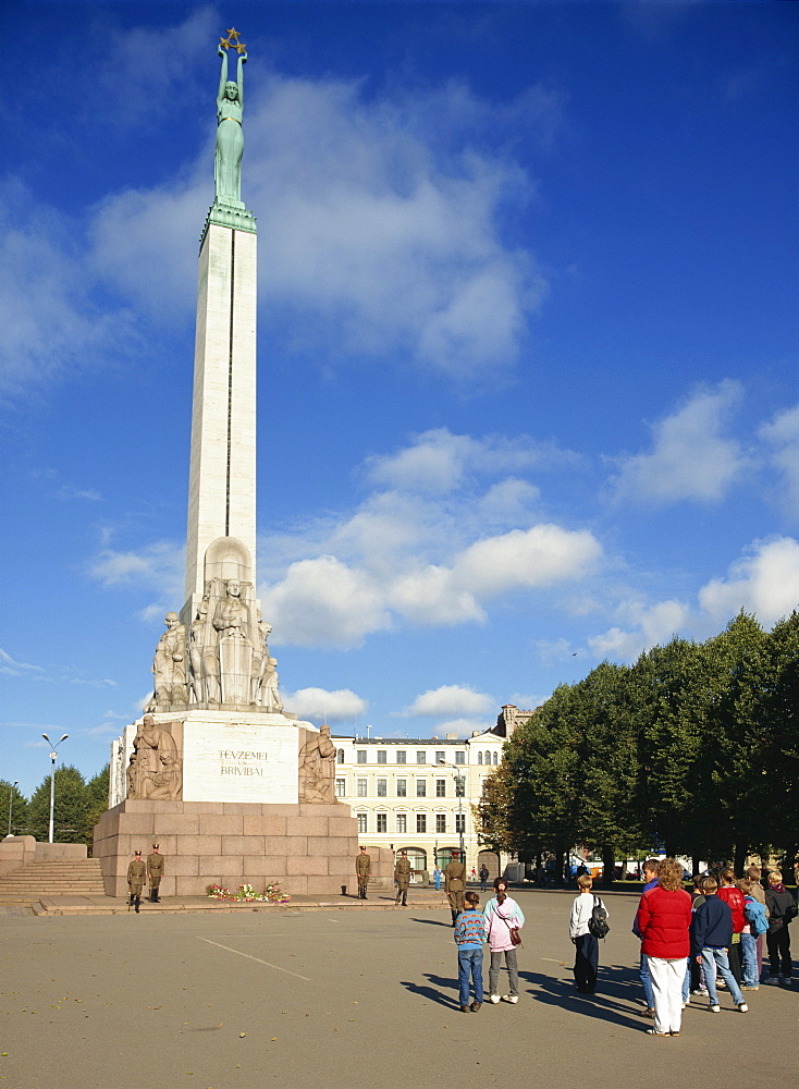 Latvians and guards in front of the Freedom Monument in the city of Riga, Latvia, Baltic States, Europe