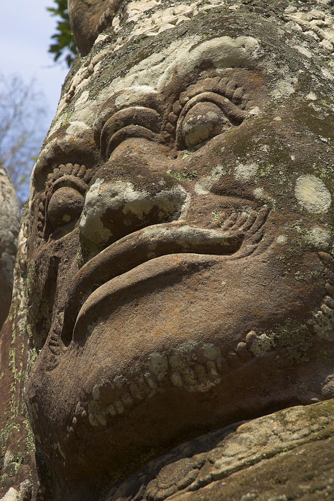 Stone statuary of human face, Ta Prohm temple, Angkor, UNESCO World Heritage Site, Siem Reap, Cambodia, Indochina, Southeast Asia, Asia