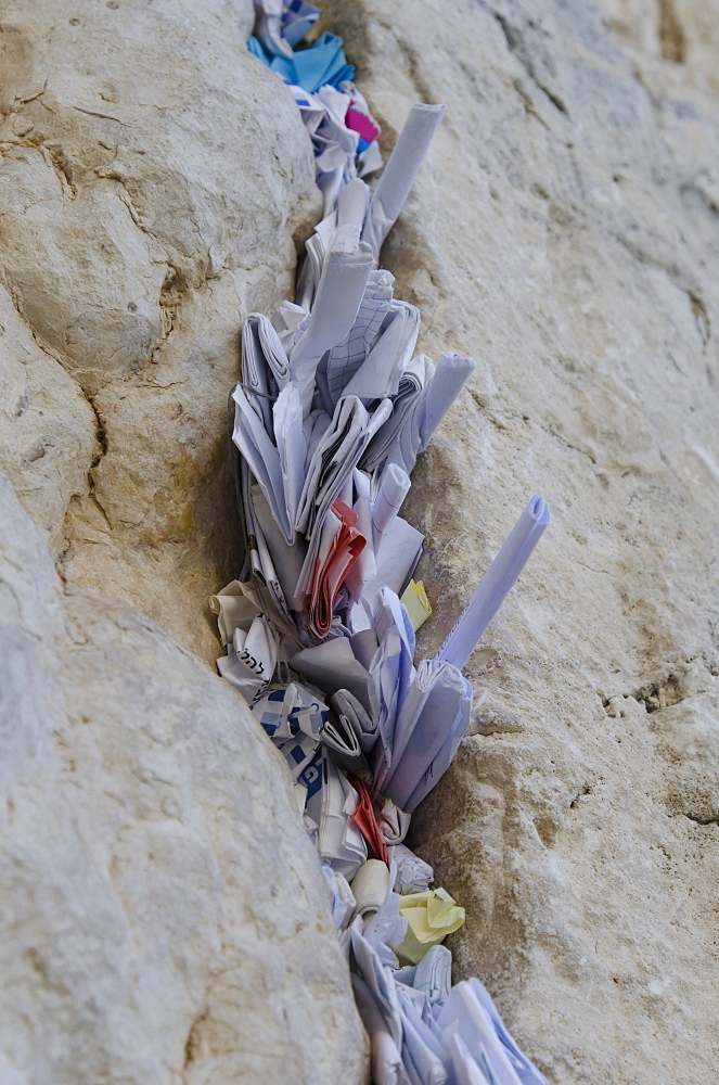 Paper notes in a crack of the Western Wall, Old City, Jerusalem, Israel, Middle East