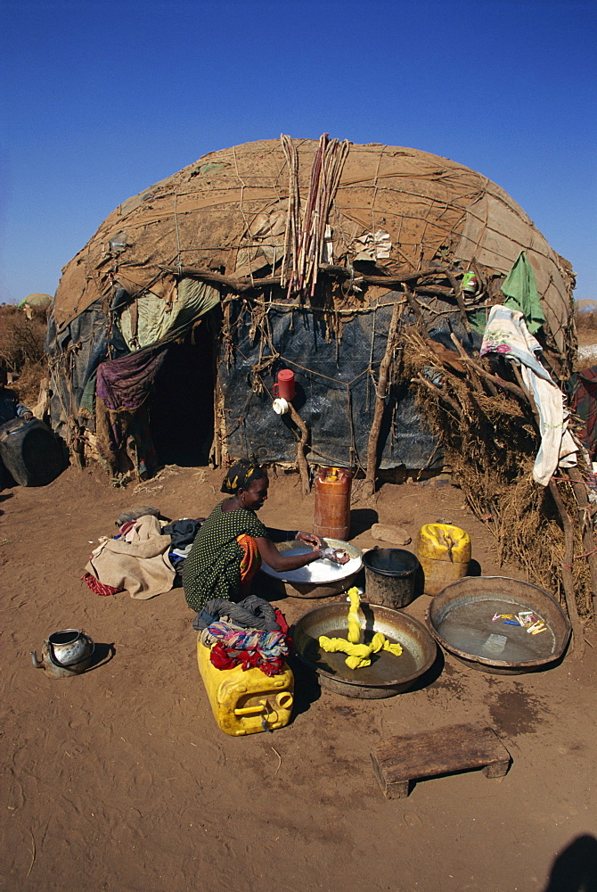 Refugee women washing clothes, Hartisheik Camp, Ethiopia, Africa