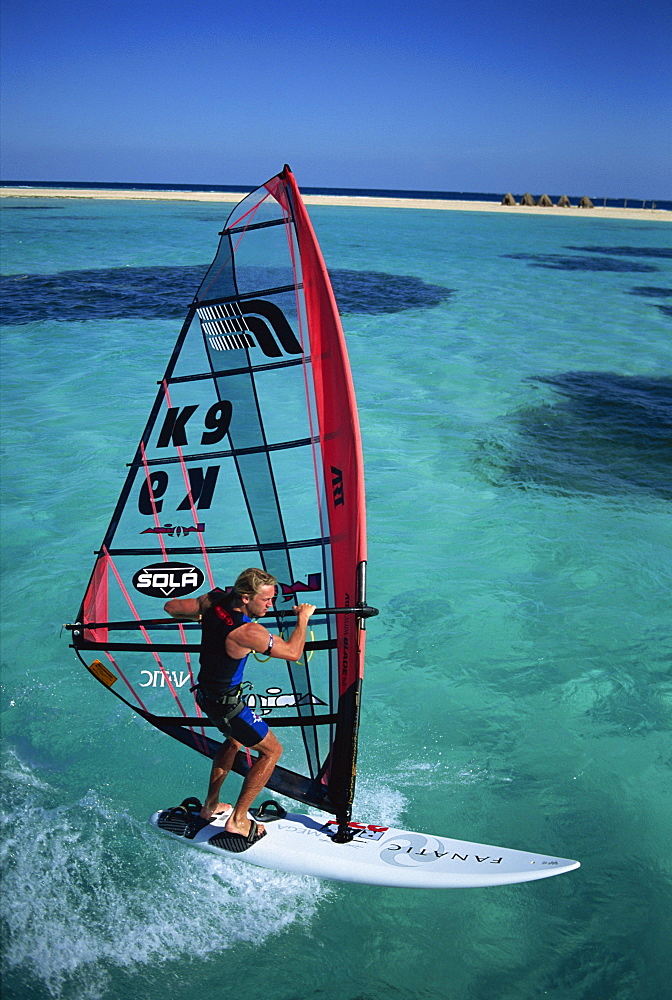 British Windsurfing Champion Guy Cribb in calm waters of the Red Sea, Egypt, North Africa, Africa