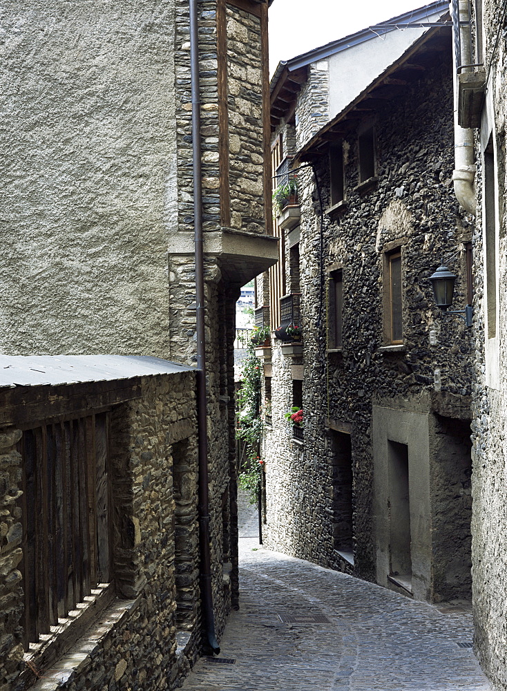 Narrow street in the old part of town, where many houses date from the 17th century, Ordino, Andorra, Europe