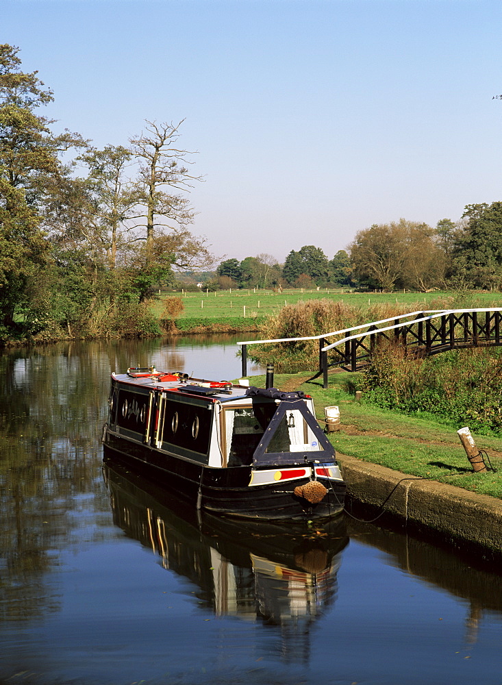 Narrow boat moored waiting to enter Craft Lock, Sutton Green, Surrey, England, United Kingdom, Europe