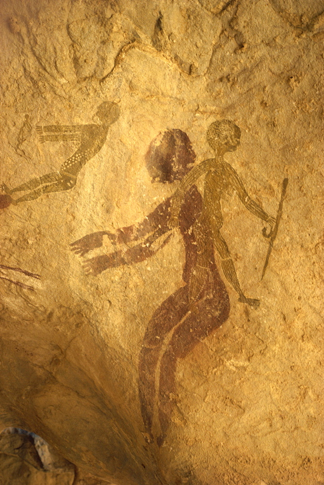 Rock paintings of decorated woman and children on cave, Tassili n'Ajjer, UNESCO World Heritage Site, Algeria, North Africa, Africa