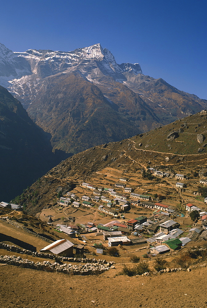 Houses and terraced fields of Namche Bazaar in the Khumbu Region, with mountains in the background, Himalayas, Nepal, Asia