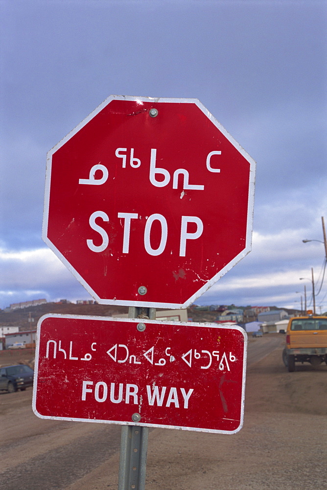 Stop sign in Iniktituk language, Iqaluit, Baffin Island, Canadian Arctic,Canada, North America