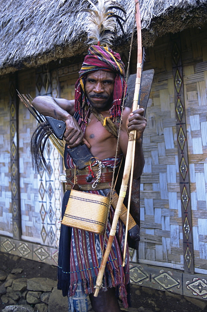 Abui tribal headhunter in warrior dress, Alor Island, eastern area, Indonesia, Southeast Asia, Asia