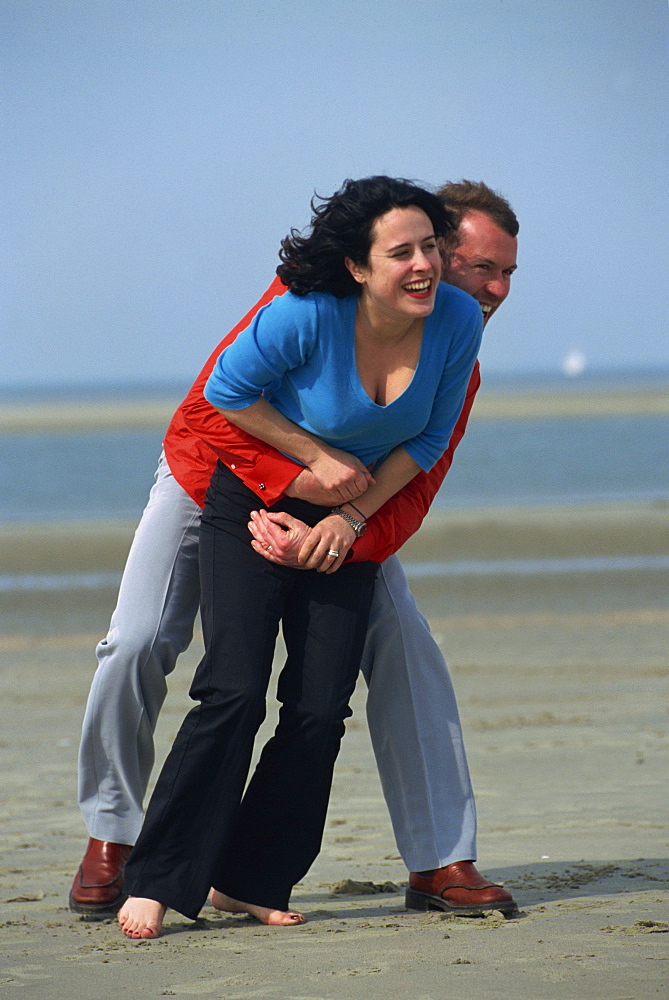 Couple on beach, West Wittering, Sussex, England, United Kingdom, Europe