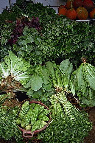 Close-up of greens for sale on a stall in the vegetable market in Ho Chi Minh City (Saigon), Vietnam, Indochina, Southeast Asia, Asia