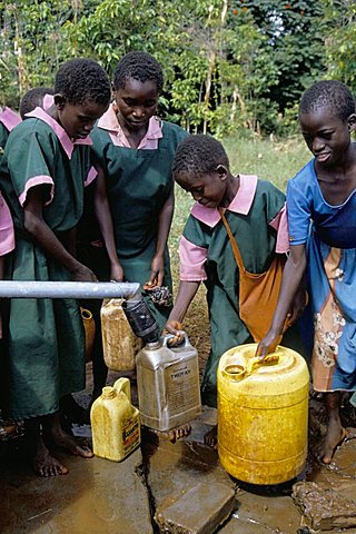 School children at water pump, Kenya, East Africa, Africa