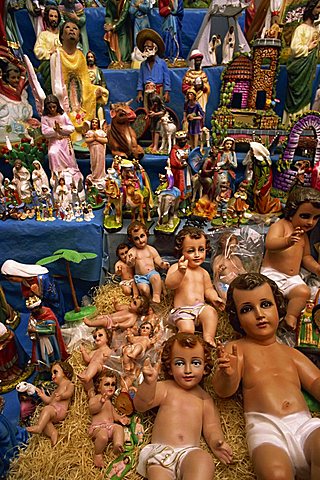 Christian nativity figures including baby Jesus dolls for sale in La Merced market in Mexico City, Mexico, North America