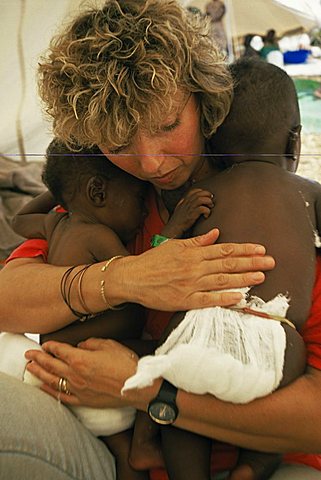 Italian nurse in orphanage, Goma, Zaire, Africa