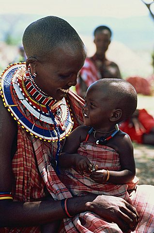 Masai mother carrying her child, Tanzania, East Africa, Africa