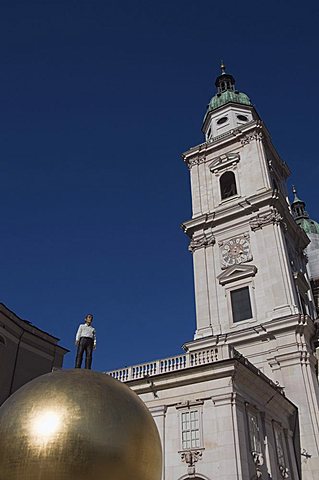 Large golden ball in Kapitelplatz, Salzburg, Austria, Europe