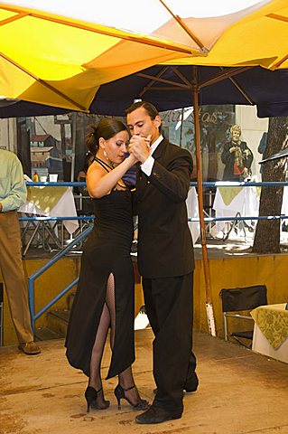 Tango dancers in restaurant in the La Boca district, Buenos Aires, Argentina, South America