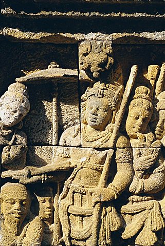 Relief carving on frieze on outside wall of the Buddhist temple, Borobodur (Borobudur), Java, Indonesia