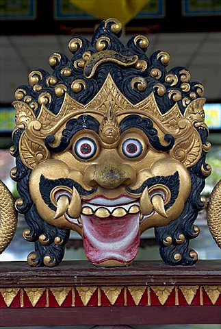 Close-up of the face of a demon at the Kraton or Sultans Palace in Jogjakarta, Java, Indonesia, Southeast Asia, Asia