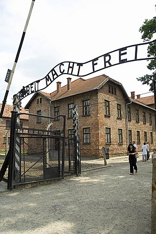 Entry gate with sign Arbeit Macht Frei (work makes you free), Auschwitz Concentration Camp, UNESCO World Heritage Site, Oswiecim, near Krakow (Cracow), Poland, Europe