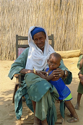 Village elder with child, Senegal, West Africa, Africa