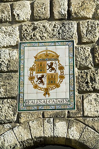 Detail of coat of arms on outer wall of the Real Alcazar just outside the exit, Santa Cruz district, Seville, Andalusia (Andalucia), Spain, Europe