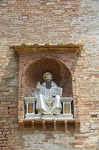 Entrance gate house, at the Benedictine Monastery famous for frescoes in cloisters depicting the life of St. Benedict, Monte Oliveto Maggiore, Tuscany, Italy, Europe