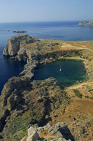 Aerial view over the rocky coastline of St. Paul's Bay, near Lindos, Rhodes, Dodecanese Islands, Greek Islands, Greece, Europe