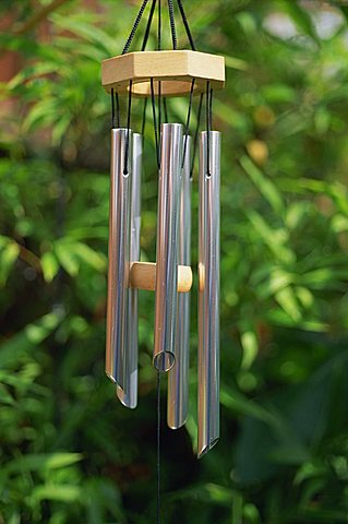 Metal wind chimes hanging outside