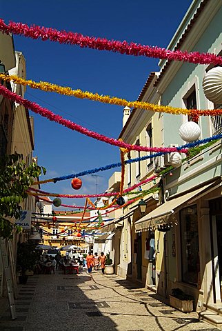 PORTUGAL, ALGARVE, SILVES, Street decorated for Palm Sunday celebrations