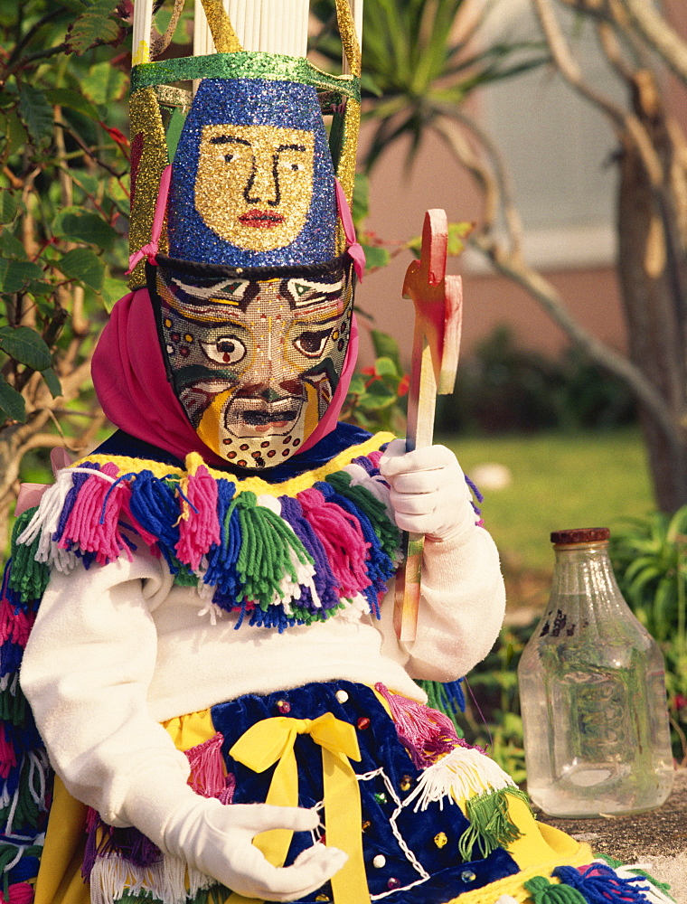 Person wearing mask, Gombey, Bermuda, Central America