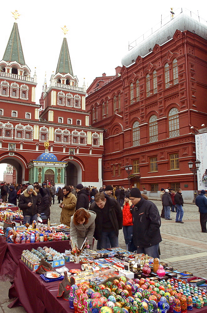 Tourists look at souvenirs near The Resurrection Gate, Moscow, Russia, Europe