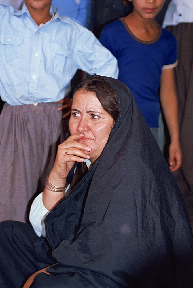 Head and shoulders portrait of a Kurdish woman at the Souk Erbil, Kurdistan, Iraq, Middle East