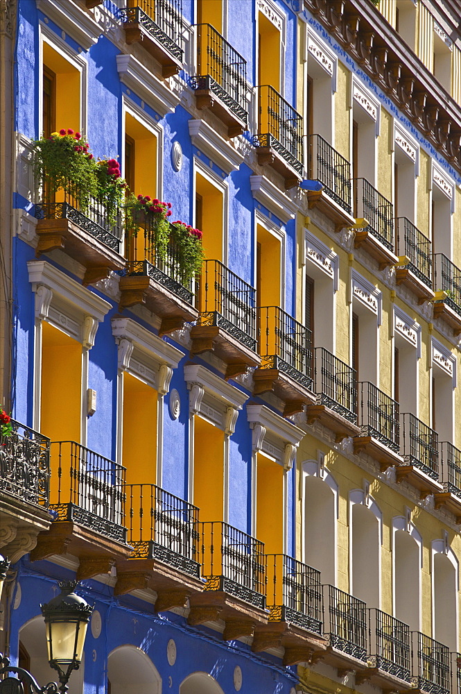 Bright coloured houses, Alfonso I Street, Saragossa (Zaragoza), Aragon, Spain, Europe