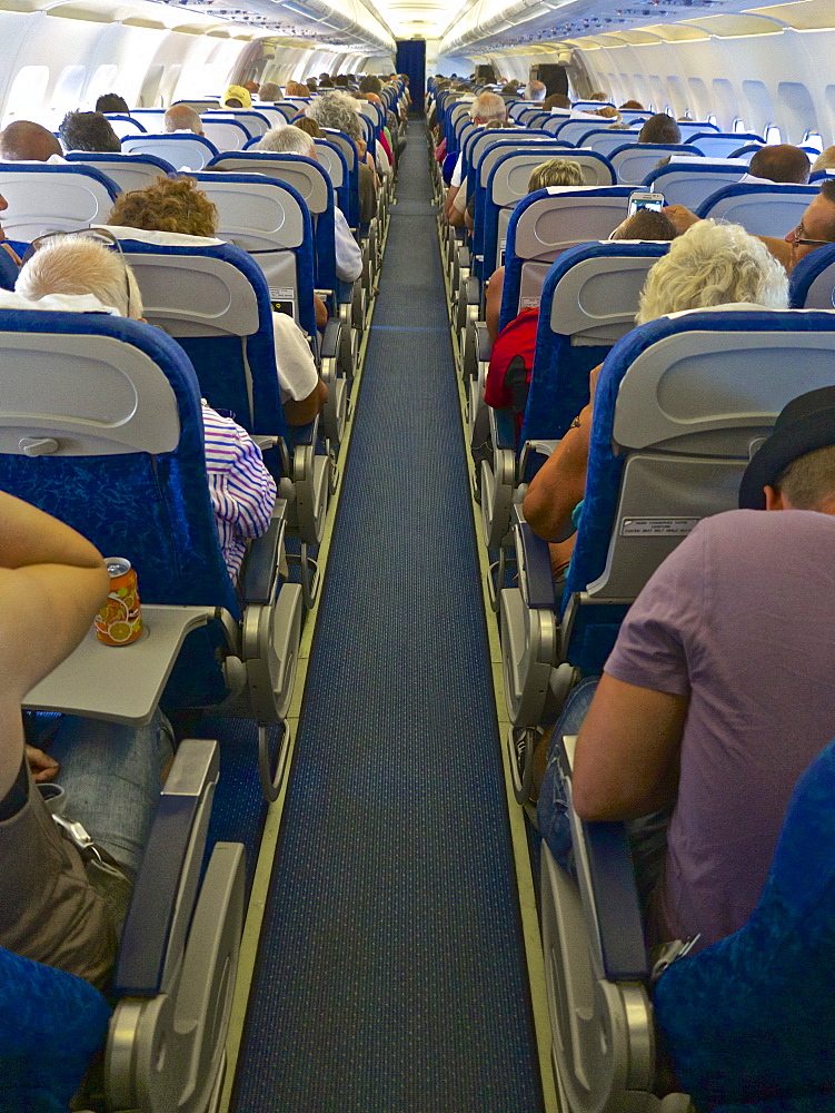 Airbus A320 plane inside cabin with passengers, France, Europe