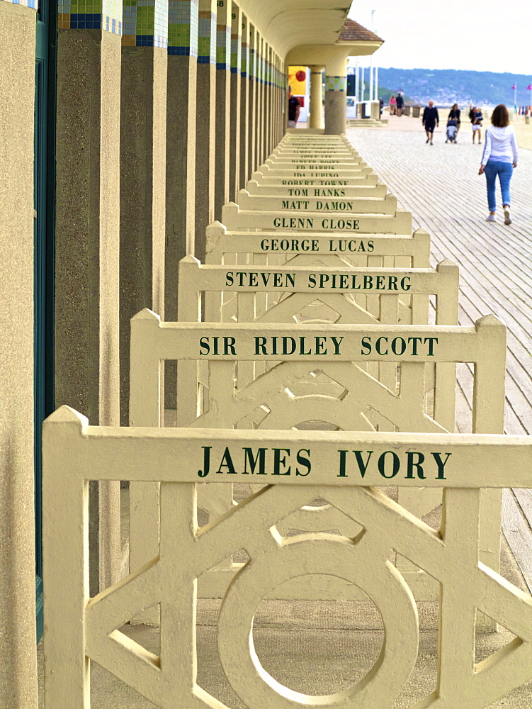 The famous Planches and the cabins of the Pompeian Baths with American actors' names painted, Deauville, Calvados, Normandy, France, Europe