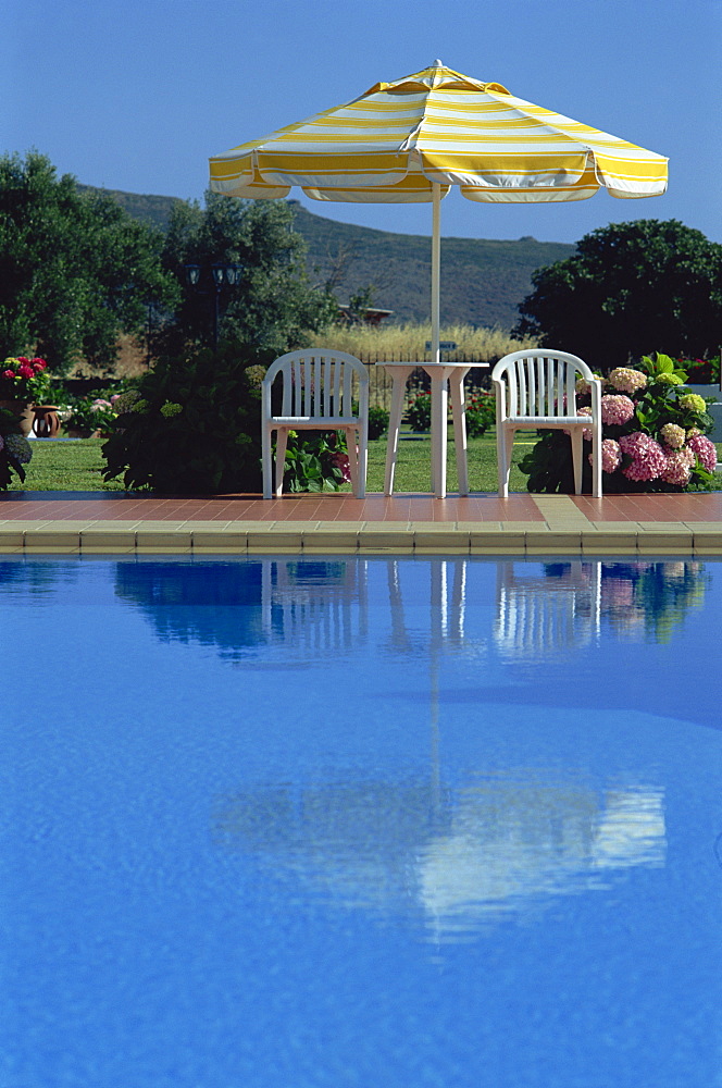 Umbrella and chairs, Hotel Bella Vista, Crete, Greek Islands, Greece, Europe