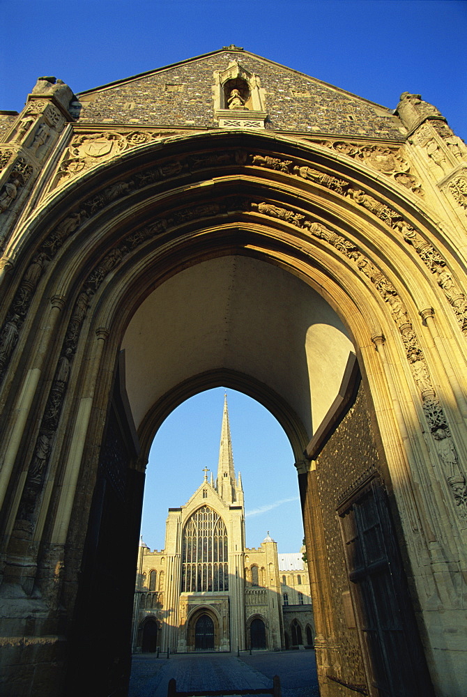 Cathedral through archway, Norwich, Norfolk, England, United Kingdom, Europe