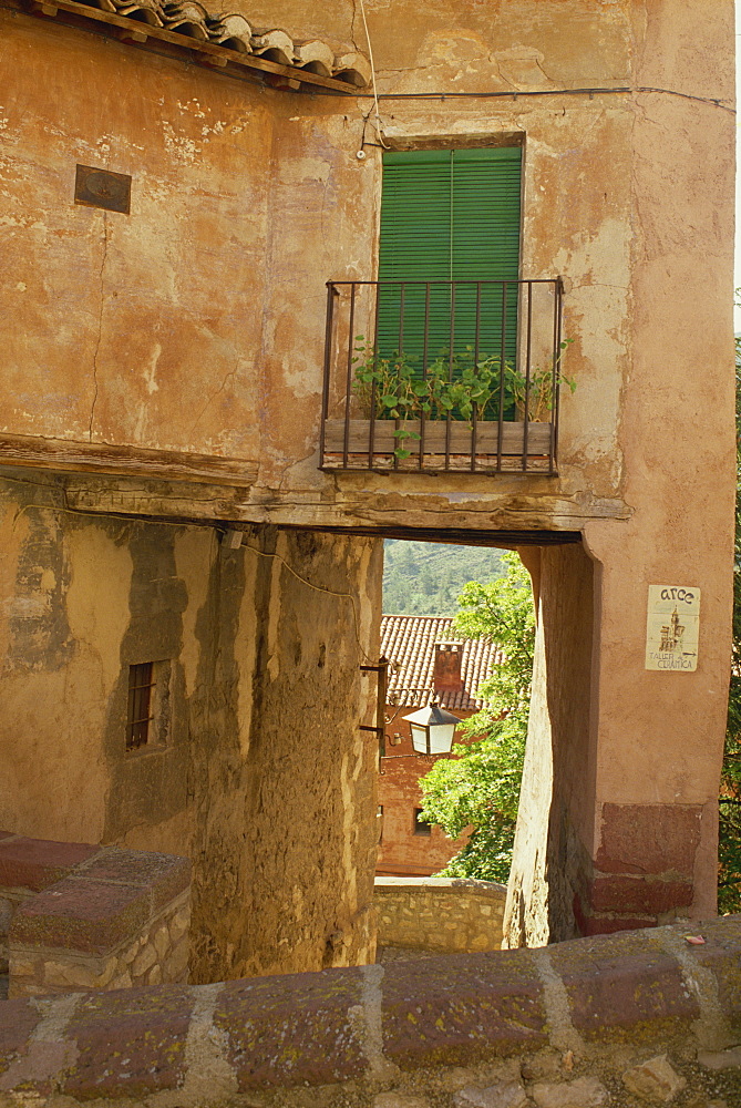 Exterior of old houses on a narrow street in the village of Albarracin, in Aragon, Spain, Europe