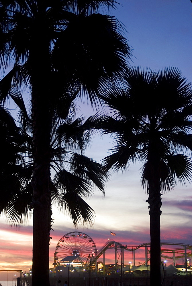 Sunset over the pier, Santa Monica Beach, Santa Monica, California, United States of America, North America