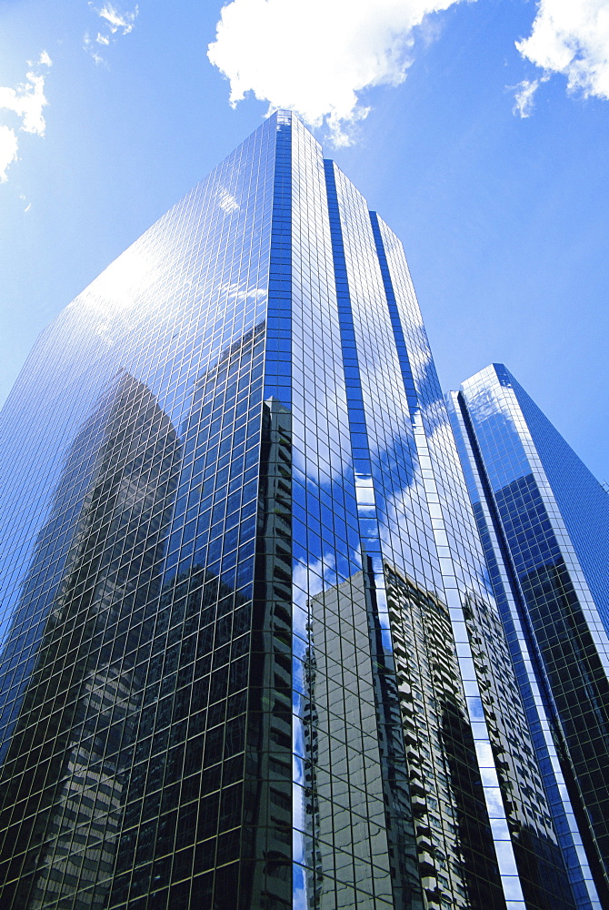 Reflections in glass of a modern skyscraper, downtown, Calgary, Alberta, Canada