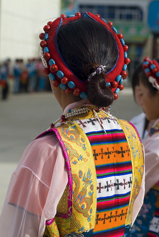 Dancer in traditional dress, Gyantse, Tibet, China, Asia