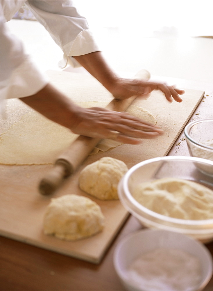 Rolling out pasta making in the kitchen, Arezzo, Tuscany, Italy, Europe