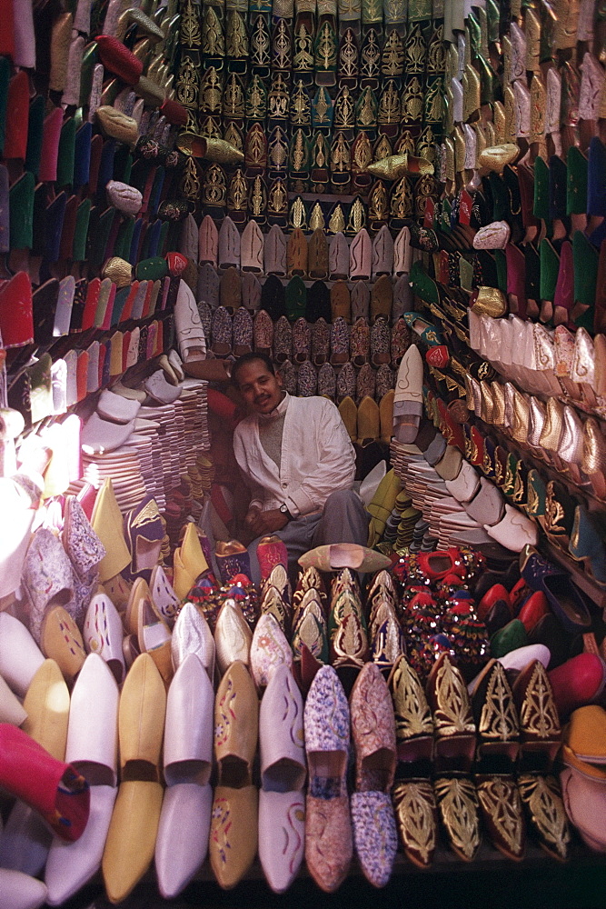 Man selling babouches (slippers), Marrakesh, Morocco, North Africa, Africa