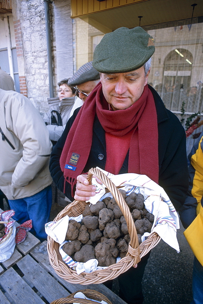 Truffle producer selling his harvest at Tuesday market, Lalbenque, Quercy region, Lot, France, Europe